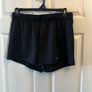 Nike women’s size L black shorts.